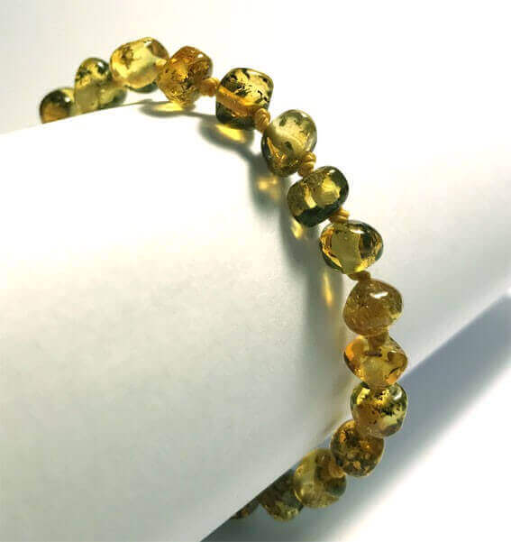 Bracelet bébé en Ambre Vert avec fermoir boules
